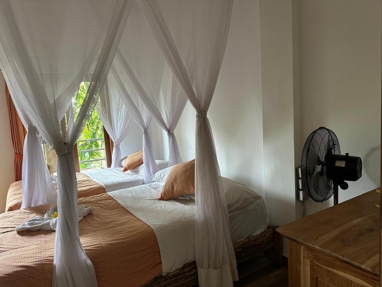 Omunity Bali Hotel ซีงาราจา ภายนอก รูปภาพ