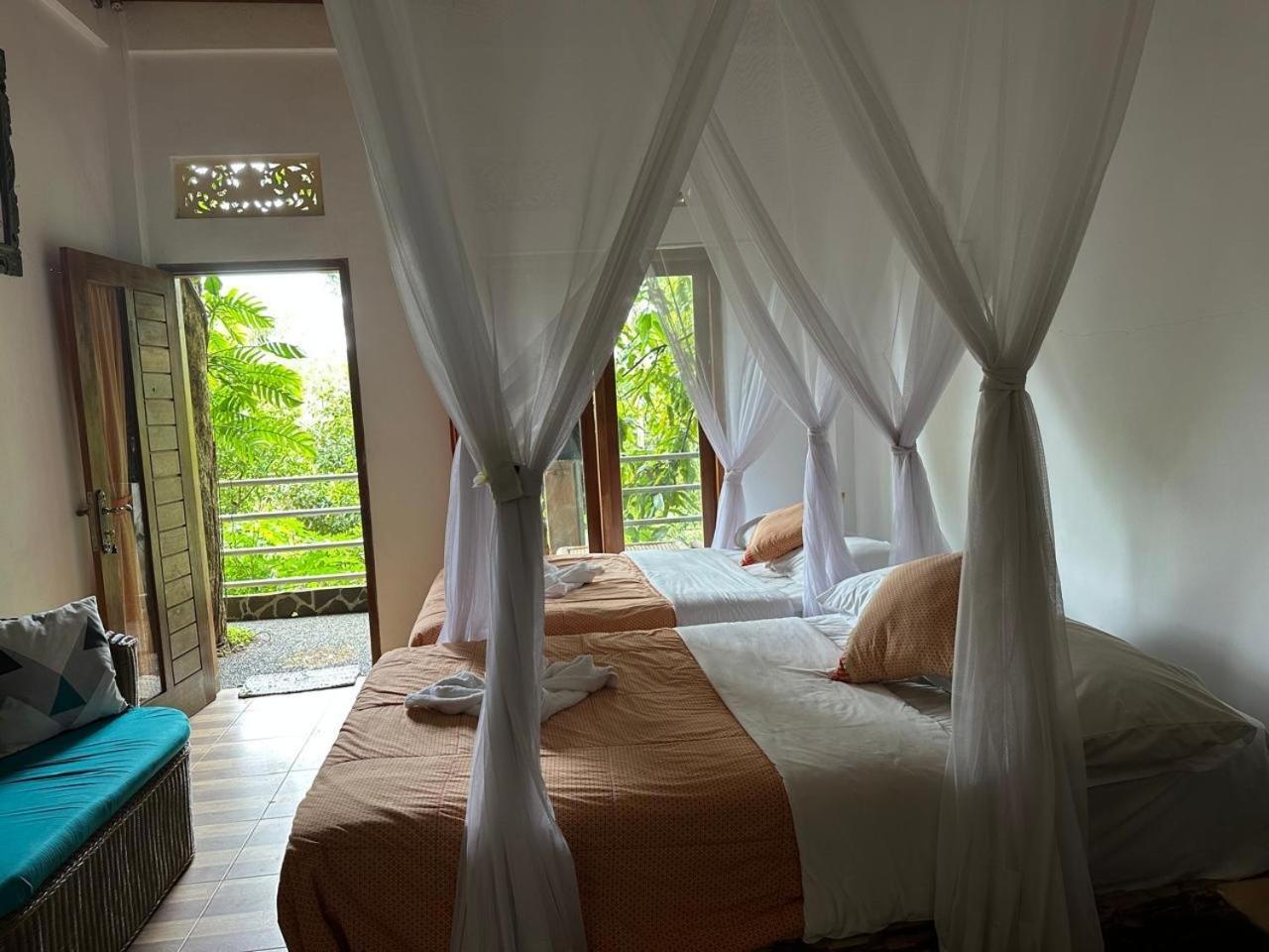 Omunity Bali Hotel ซีงาราจา ภายนอก รูปภาพ