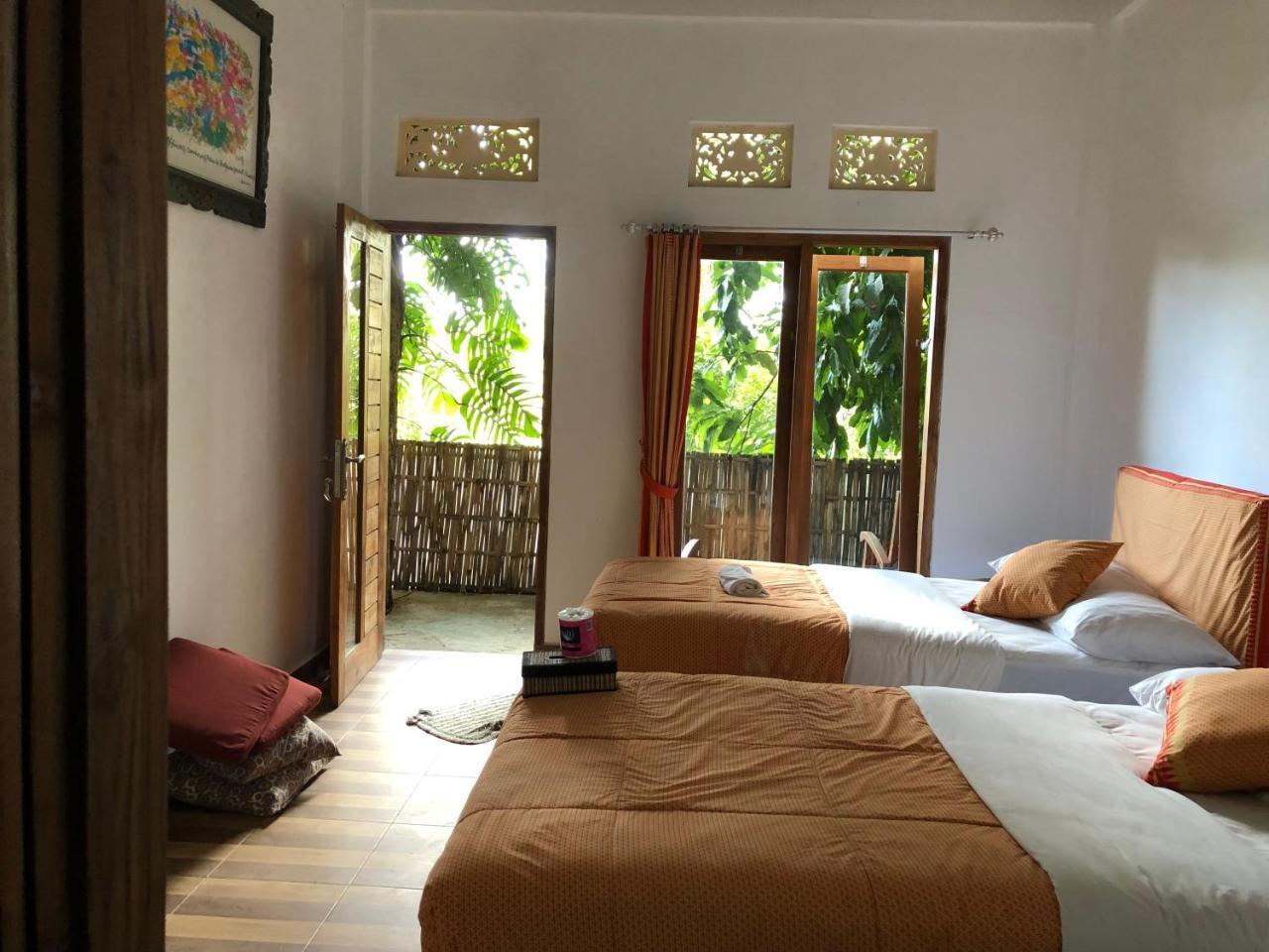 Omunity Bali Hotel ซีงาราจา ภายนอก รูปภาพ